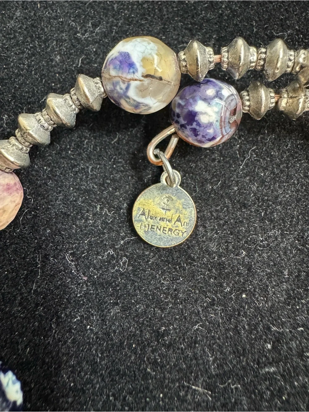 Multi-color beaded bracelet from Alex and Ani.  Infused with + Energy Technology
